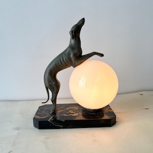 The joyful greyhound in marble and spelter, art deco lighting