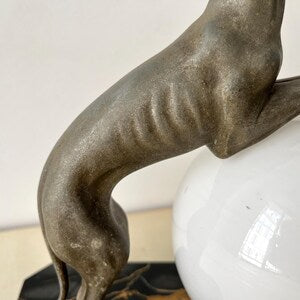 The joyful greyhound in marble and spelter, art deco lighting